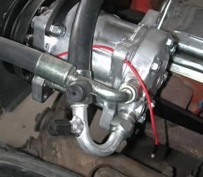 IF YOUR VEHICLE IS EQUIPTED WITH A DIFFERENT ENGINE PACKAGE IT WILL BE NECESSARY TO ROUTE THE HOSES DIFFERENT Locate the Discharge hose and (1) #8 o-ring.