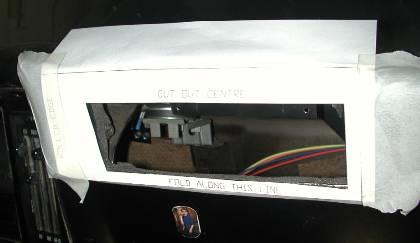 Cut out template and tape to the dash pad.