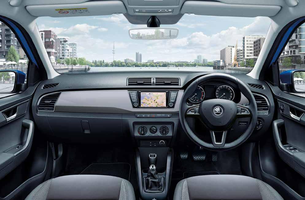 FABIA INTERIOR FEATURES Equally captivating is the car's interior with quality materials and precise workmanship wherever you look.