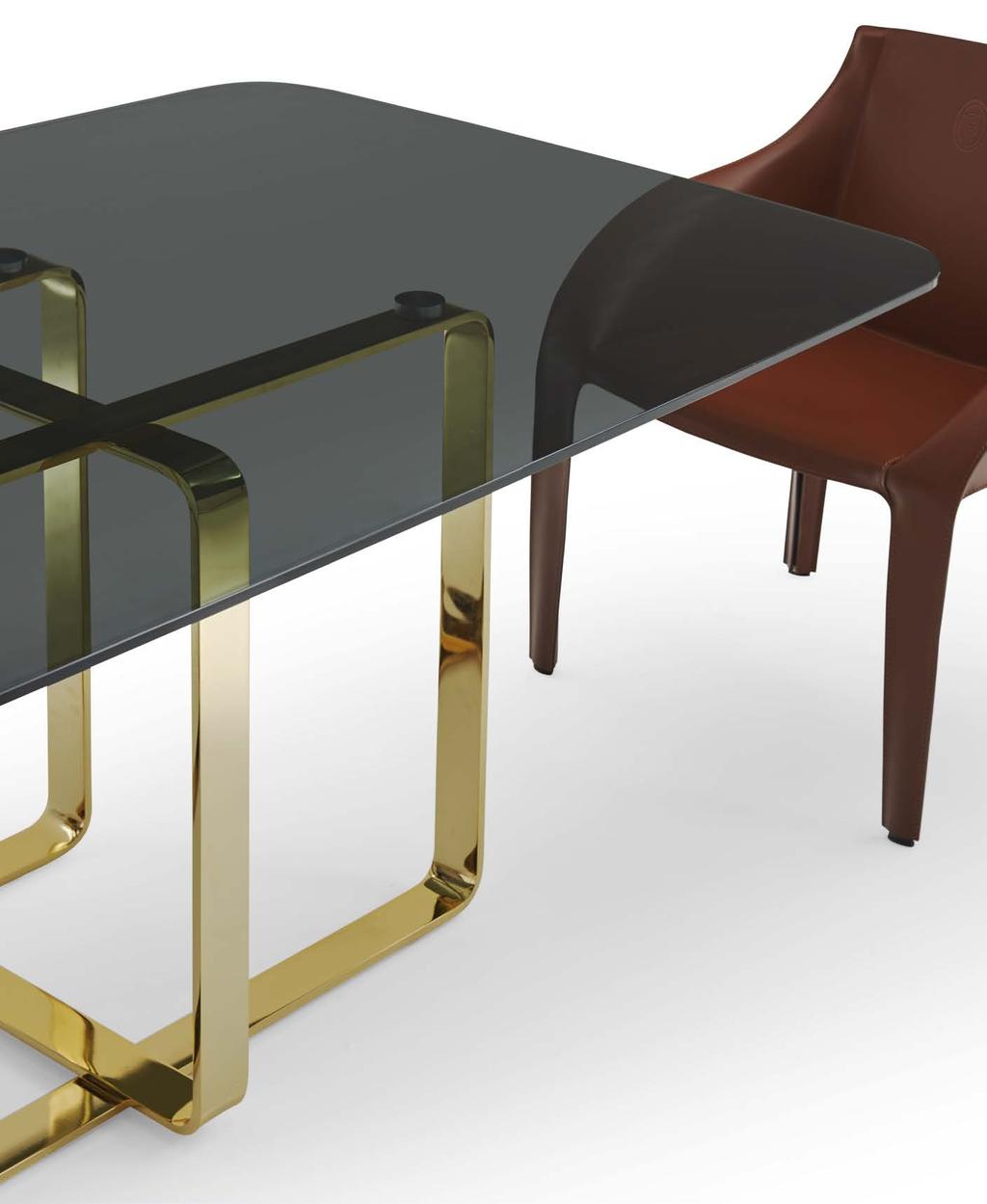 CLETO Table, TTV (17) Smoke grey tempered glass top and steel legs with polished brass finishing.