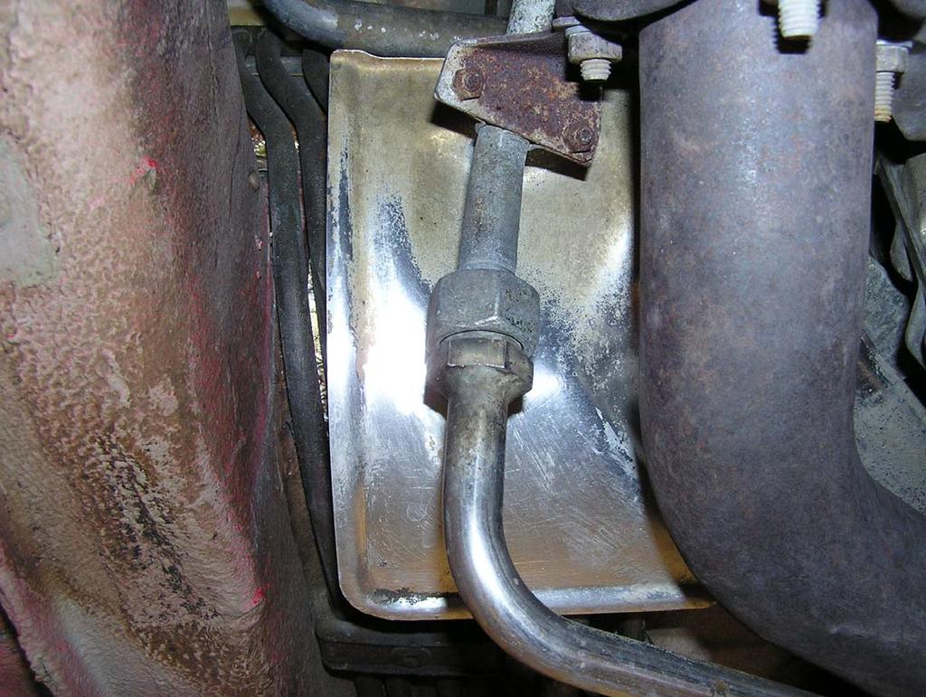 Disconnect Air Pump feed line to factory catalytic converters (27mm and 4mm) Remove rear clamps from factory catalytic converters. (15 or 17mm).