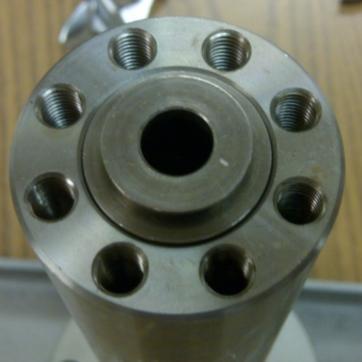 Tighten (4) cap screws» Use a cross pattern when tightening to