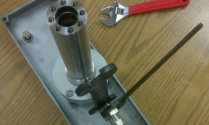Tighten (4) cap screws on pump to