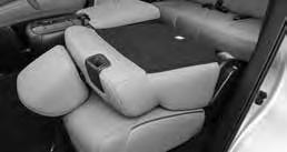 Raise the armrest (captain s chairs) so it is parallel to the seatback and in the stowed position.