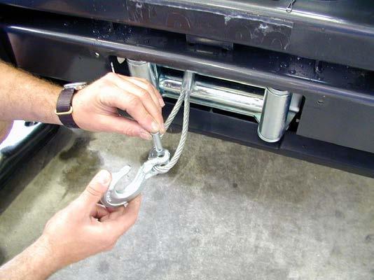 (If fitting with winch) Connect the winch control box cables to the winch motor. Refer to the Warn handbook for additional information.