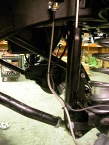 All other models install the brackets and pins where the sway bar links will be parked when disconnected, as shown in the photo. 32. The four-inch kit requires re-routing the front ABS lines.