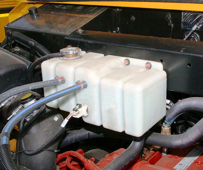 OVERVIEW INSTRUCTIONS f o r : 10007704 Kit, Surge Tank Replacement This kit replaces the -equipment coolant surge tank with an improved tank and mounting system.