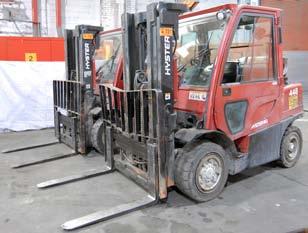 STAMCO packaging line Partial view of forklifts available 1998 JLG rough terrain boom lift HYSter H80 7850 lbs.