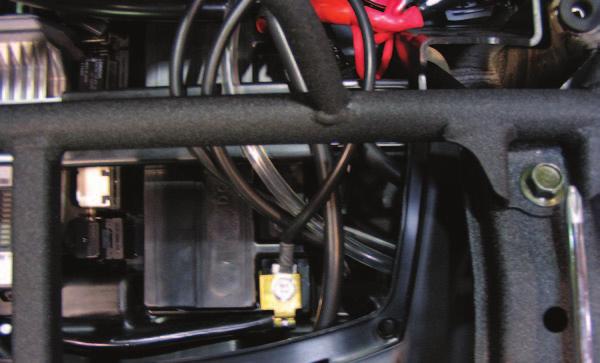 16 Plug the RED/WHITE wires of the PCV wiring harness in-line of the coil and the stock RED/BLACK