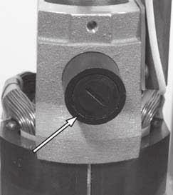 General Maintenance continued 3. See Figure 22. Remove the three electric cover screws and remove the motor cover. Figure 22. Electric Cover Screws 4.