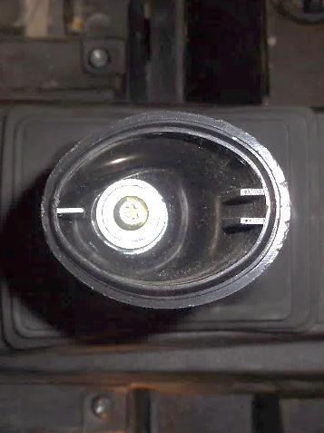 Remove the two center console bolts (one on