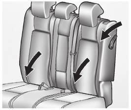 54 Seats and Restraints To tumble the seat: 1. Unbuckle the rear safety belts and put the front seatback in the upright position. Reclining Seatbacks 0 48. 2. Push the headrests down all the way.