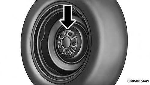322 WHAT TO DO IN EMERGENCIES Inspect the wheel mounting surface prior to mounting the tire and