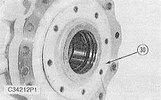 pinion. 19. Remove distance collar (29) from the main case. 20.
