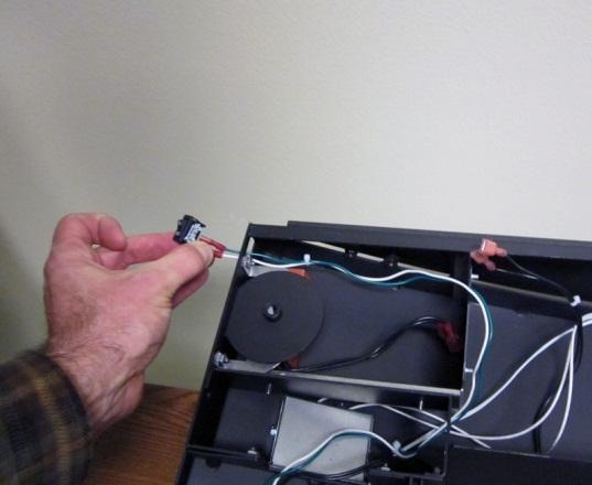 E. Route the On/Off switch wires through the switch hole and attach to the On/Off switch, as