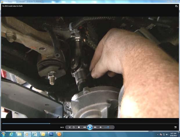 Install the rack and pinion spacer in-between the rack and pinion and frame on the passenger side