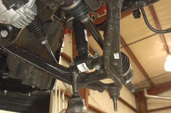 Using a 15mm wrench and socket remove the sway bar links
