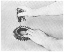 DETAILED REASSEMBLY INSTRUCTIONS A. To Reassemble the Drive Gear Assembly 1. Install snap ring in ID of drive gear (See Illustration #55). 2.