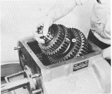 REASSEMBLY 25. Install the short key in keyway in mainshaft to lock the 4th speed gear washer in position (See Illustration #101). 26.