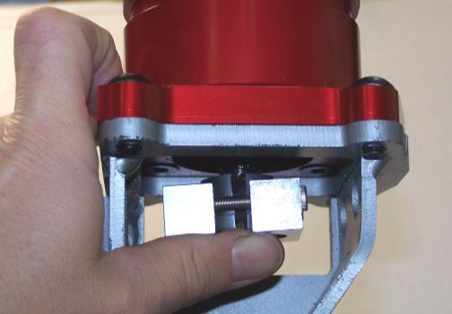 A. INSTALL SHIFT TOWER AND MOUNT 1. Loosen the bolts on the horizontal shift link at the rear of the transmission, and pull the link clamp away from the horizontal shift link.