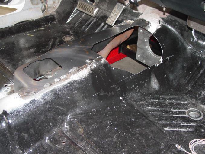 4. Align the new sheet metal so that the slit is towards the rear of the car. Slightly bend the sheet metal along the slit to form a shallow corner.