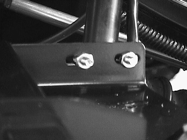 3. Place the 1\4-20 x 1, U-bolts into position at the rear of the mounting plate and tighten with the hex nuts and lock washers provided. 4.