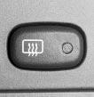 Rear Window Defogger (Rear Defogger): Press this button to warm the defogger grid on the rear window. An indicator light below the button will glow while the rear window defogger is operating.