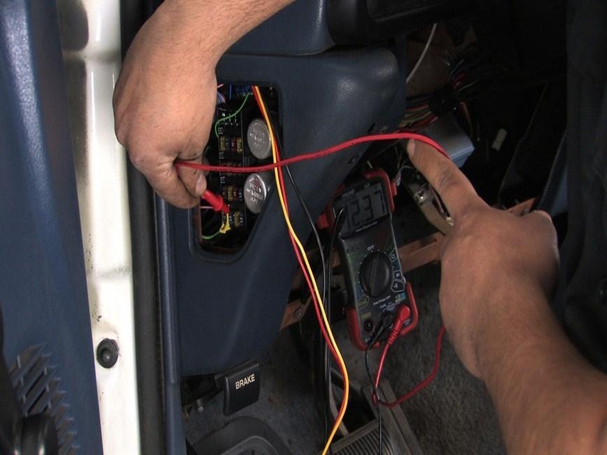Using a multi-meter identify the switched 12 volt source that powers your headlights.