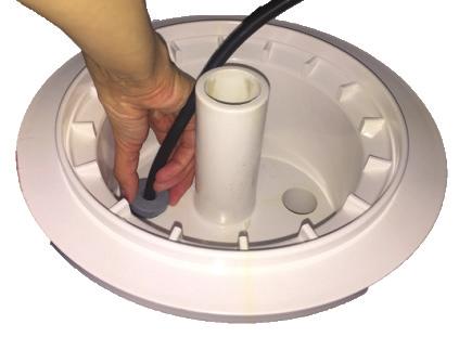 7 6. Install the new FireFX LED Light assembly: Push the light into the niche while pulling the power cord from the junction