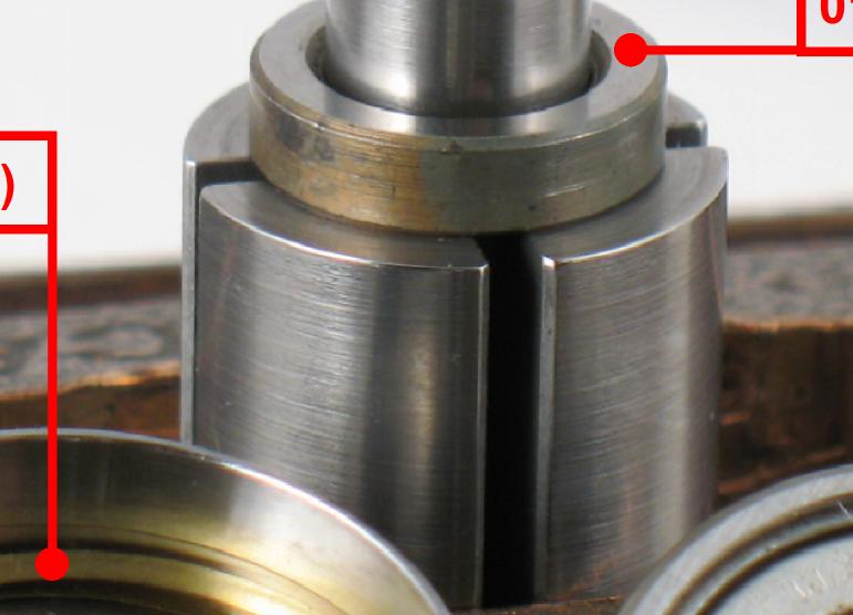 Fasten the rotor in a vise with aluminum or bronze jaws so that the rotor