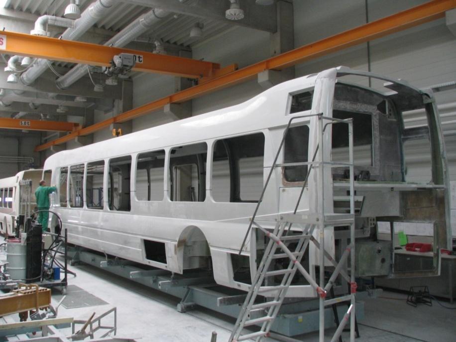 Vehicle Construction and Assembly With the top and bottom sections attached, work