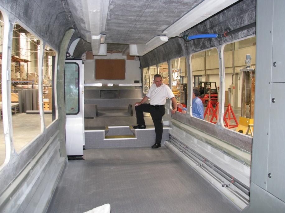 Final Bus Assembly With the paint and floor installation complete, the bus is prepared for