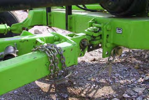 OPERATION 6. Securely attach the flex arm safety chain to the mowers a-frame.