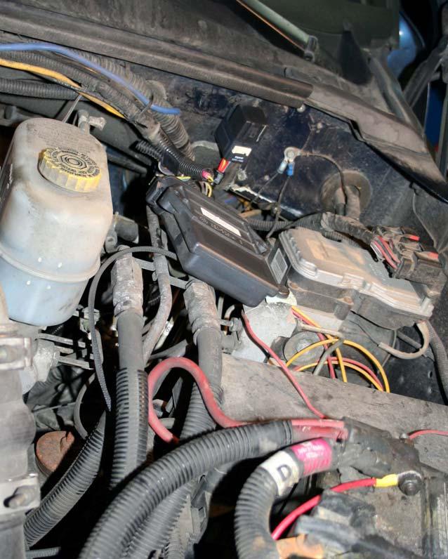 Lay out the wiring harness so that it can be plugged into the stock fuel pump harness, plug into the new FlowMAX Fuel Pump, and