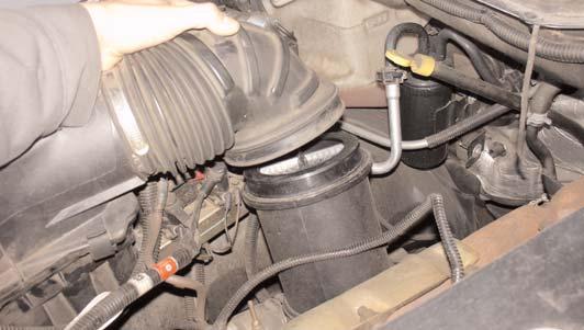 Figure 11 Disengage the flexable air intake duct from the
