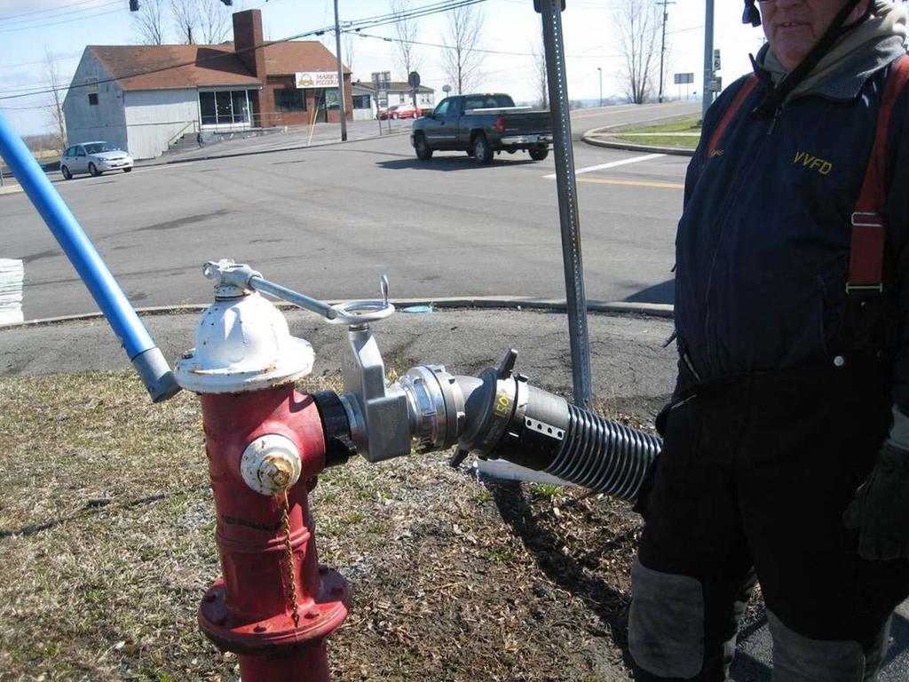 Ovid Fire Hydrant Fill Site A control valve is placed on the hydrant and a hard suction hose is connected to the