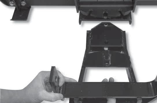 Insert the front of the pivot assembly (KK, Figure 13) into