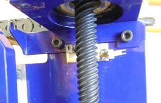 Reinstall nut block and motor assembly screws.