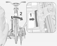 Fold the rear carrier system backwards The rear carrier system can be folded backwards to gain access to the load