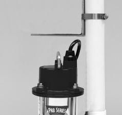 Cut a piece of 1½ rigid PVC pipe long enough to reach from the elbow of the backup pump to (1) foot above the floor. Prime and cement it to the 1½ pipe adapter, then screw the adapter into the pump.