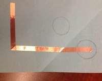 6. Starting inside the circle in the top of the fold, place your copper tape in a straight 34 inch line