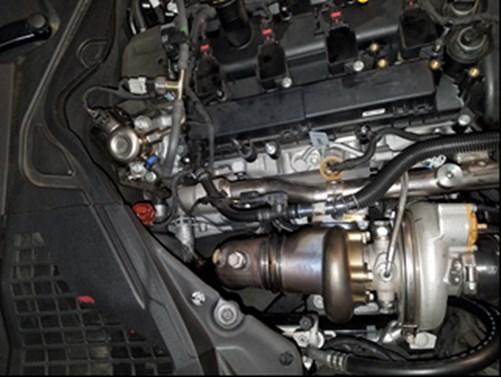 It is helpful to loosely install the v-band clamp to secure the joint between the turbo and the