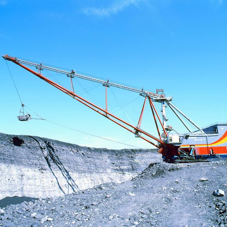 EXCAVATORS Walking Draglines They are used in open pit mining (coal, shale, ferrous and nonferrous metal ores, gold, raw materials for chemical industry and refractories, etc.).