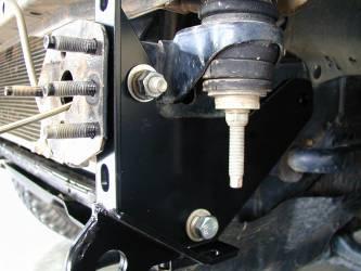Fit the chassis mount braces to the vehicle using the M x 30mm fine pitched bolt, M spring