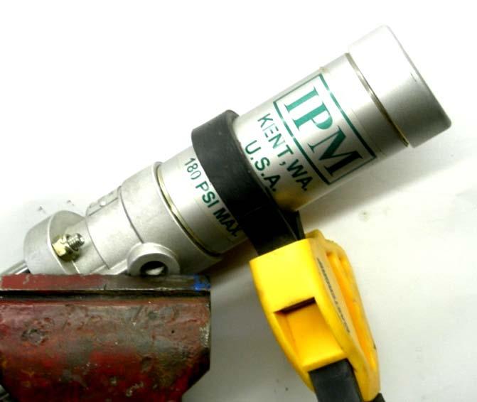 Remove the air cylinder either by hand or by using a strap wrench.