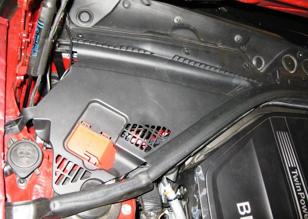 Pull up on cover to get rubber mounts off of mounting pins. See figure 1. 2. Remove right side cover in engine compartment.