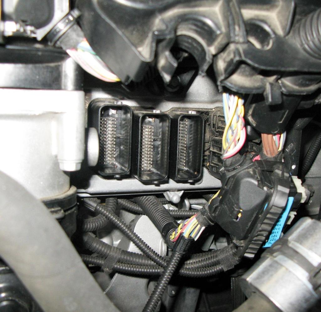 4. Disconnect the first three large connectors on the engine control unit. See figure 3. You have to start with the back large connector (1) and work your way forward to connector (3).