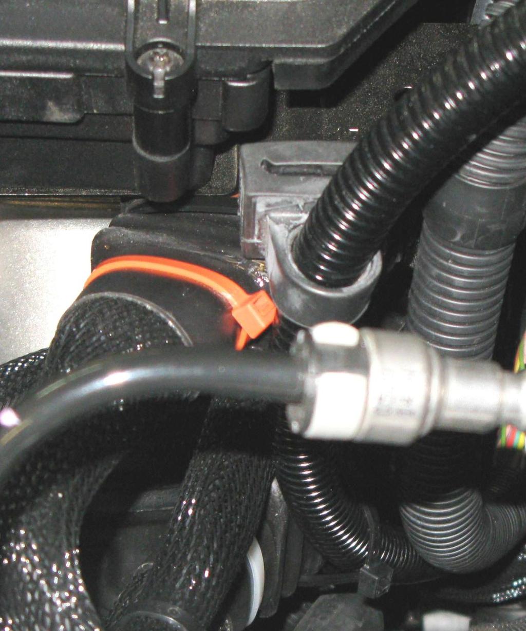 attached to bracket as shown in figure 27. Lower connector 26.