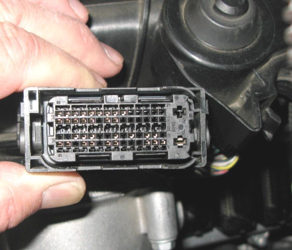 11. The Orange Interrupt sections get installed first. It goes between position (3B) on the ECU and the stock connector that has 4 rows of small connectors, two large connectors and is black in color.