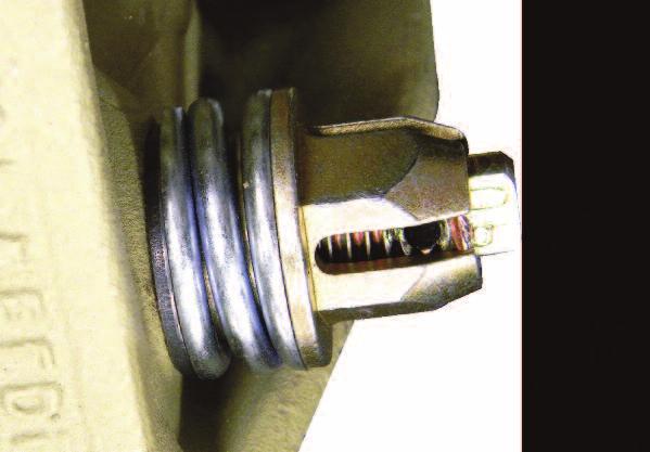 Clamp Tightening Guidelines The Spring Retainer (slotted nut) controls the compression of the spring.